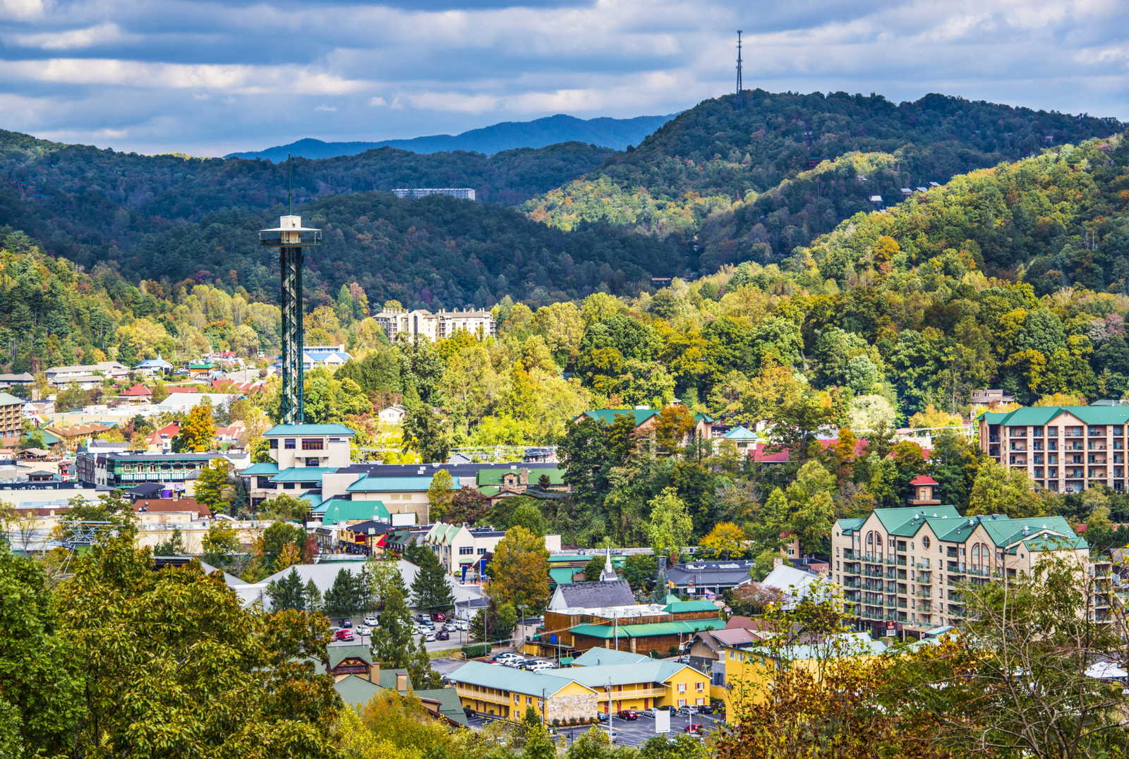 view of downtown Gatlinburg surrounded by the Smoky Mountains