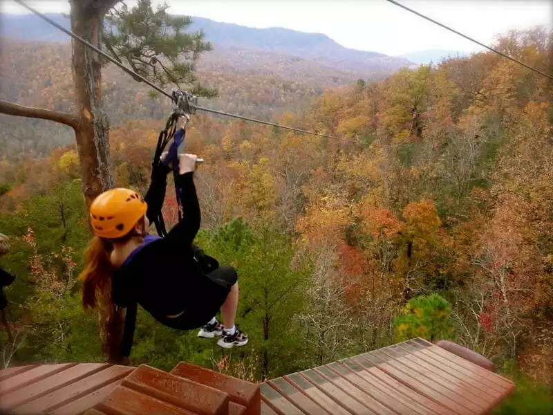 Gatlinburg zipline tour above fall foliage