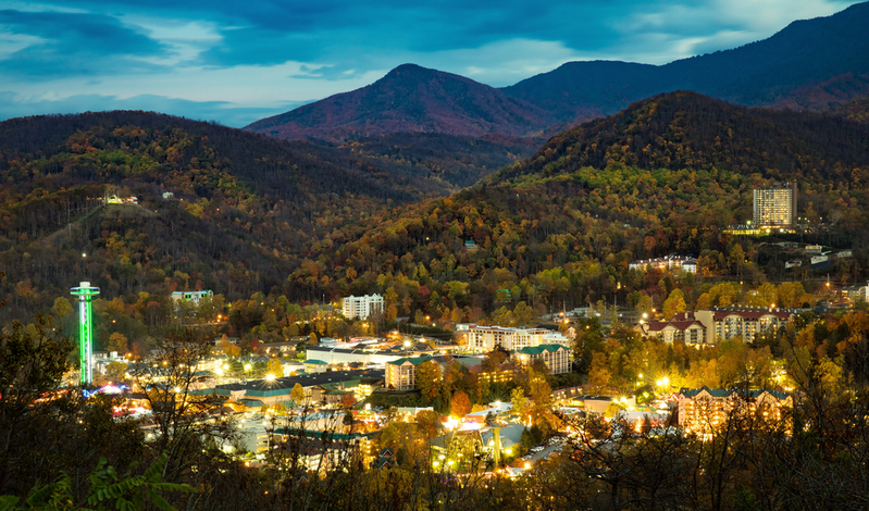 nighttime view of downtown Gatlinburg and surrounding Smoky Mountains 