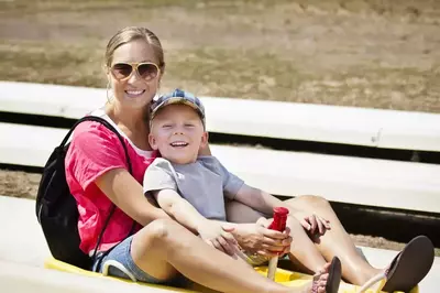 mom and son on alpine coaster