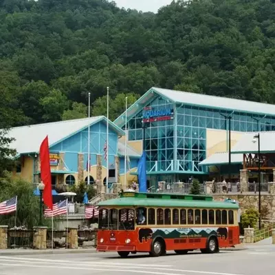 View of Gatlinburg Aquarium and a Gatlinburg trolley