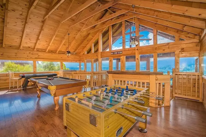 game room in Gatlinburg cabin with foosball and pool tables